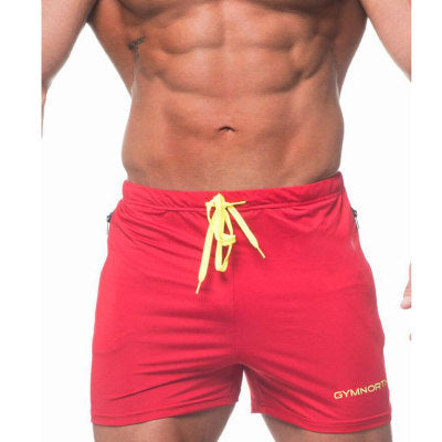 Red shorts with yellow drawstring on a white background