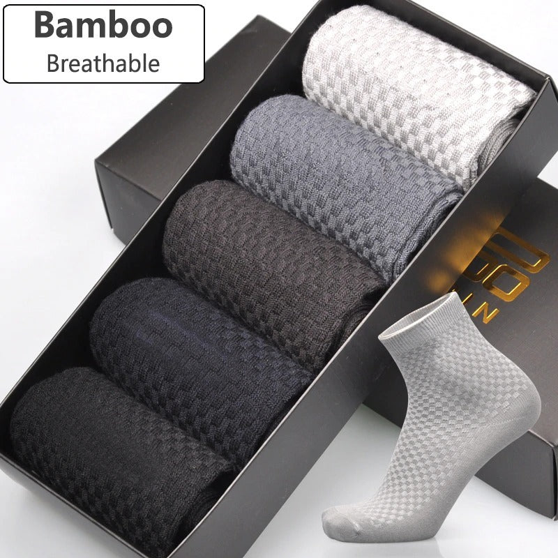 A set of men's bamboo fiber socks displayed in a box, with the socks visible outside the box showcasing a textured design and available in various colors.