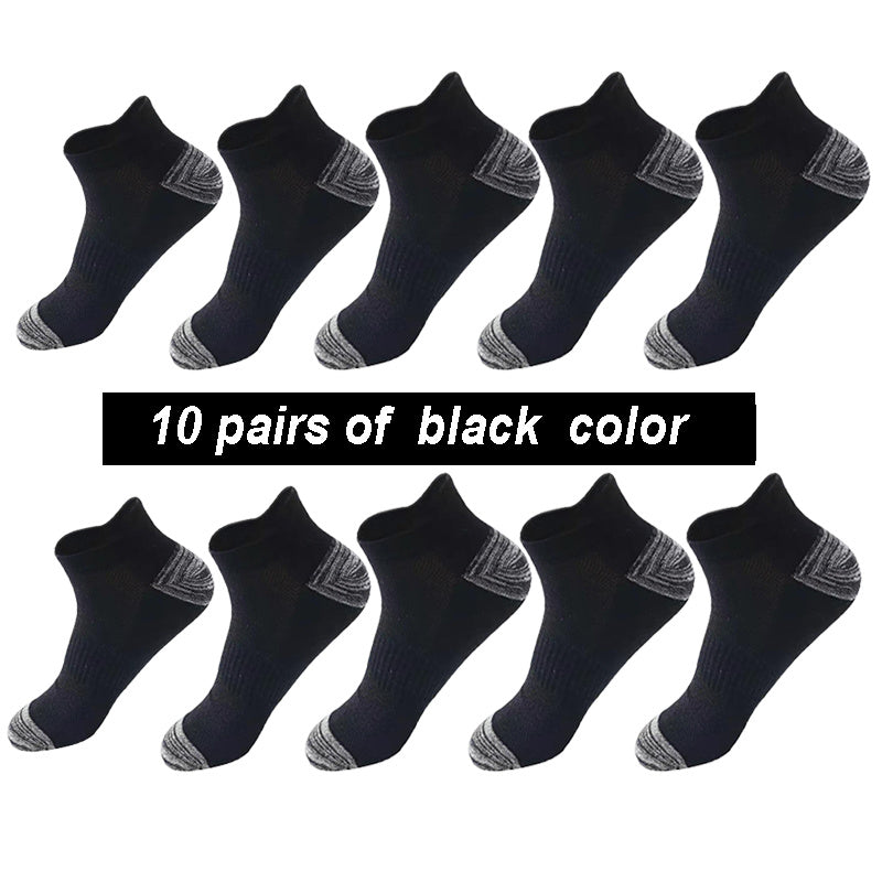 10 pairs of black socks with gray accents on a white background