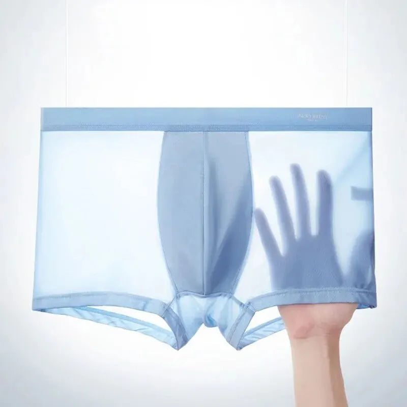 Light blue underwear held up against a white background
