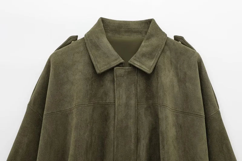 Green suede jacket on a white background