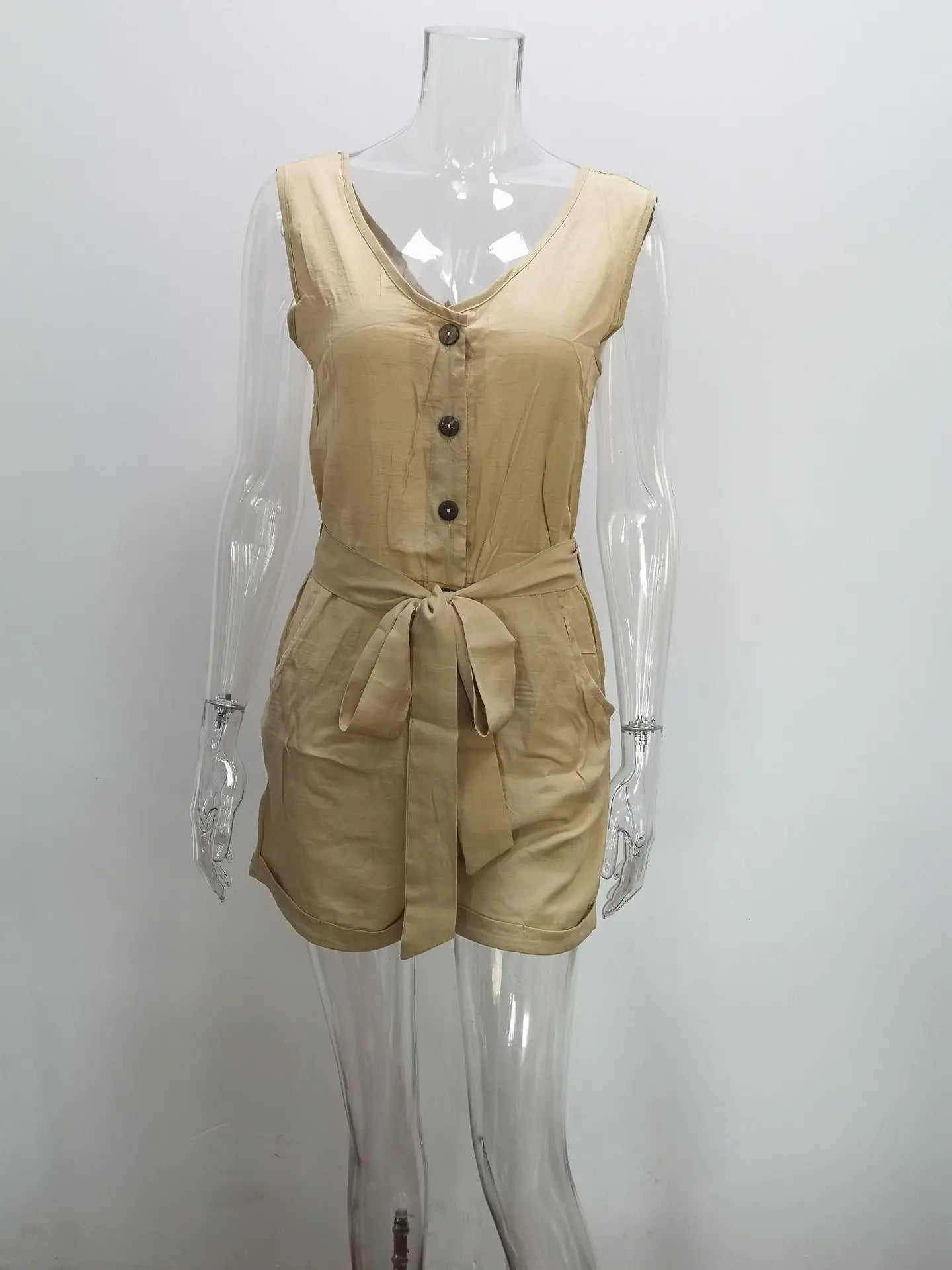 Beige sleeveless top and shorts set on a mannequin against a white background