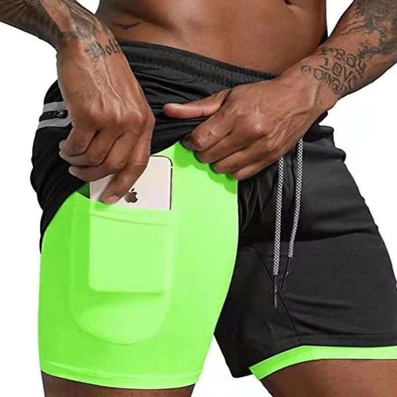 A pair of men's sport shorts in a neon green and black color with a drawstring waist. The image shows the person bending over to demonstrate the pockets on the shorts.