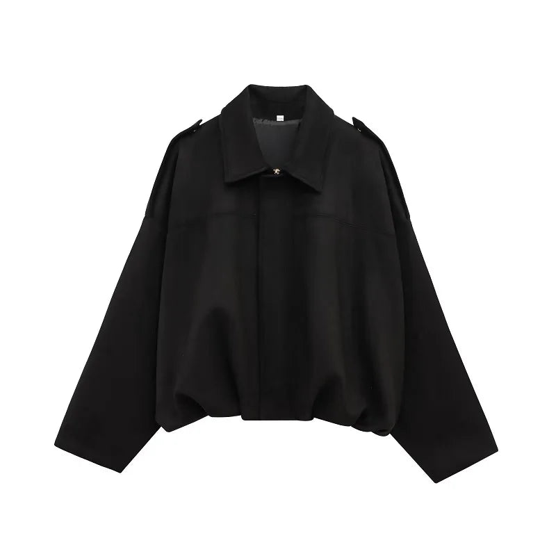 Black blouse with a collar on a white background