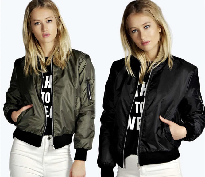 Two images of a person wearing bomber jackets with different color schemes.