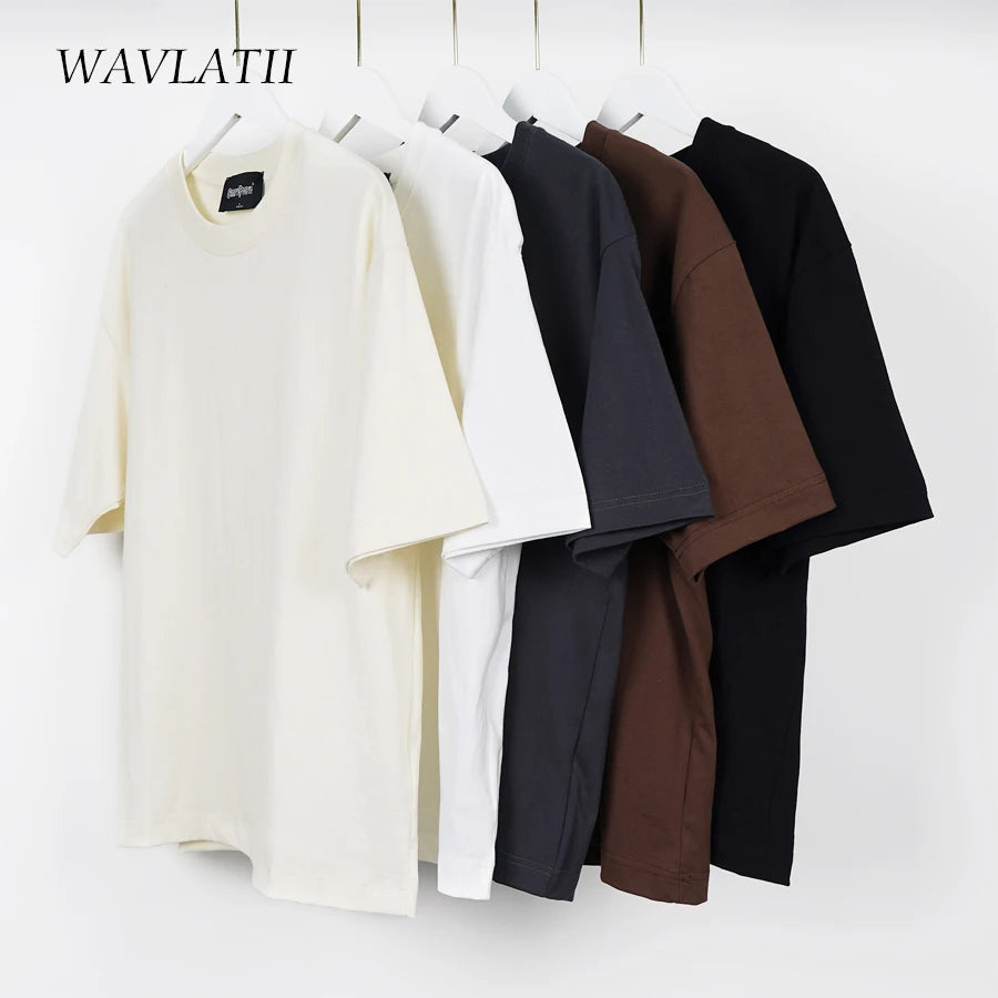 A collection of WAVLATII brand T-shirts in beige, black, brown, and navy colors, displayed on hangers against a white background.