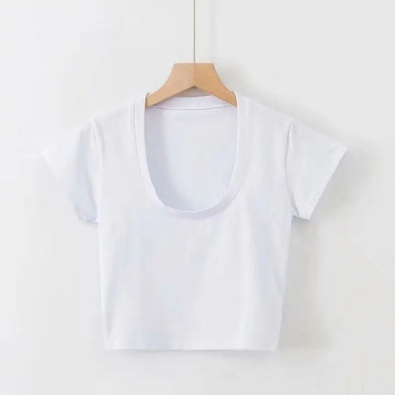 White t-shirt on a wooden hanger against a white background