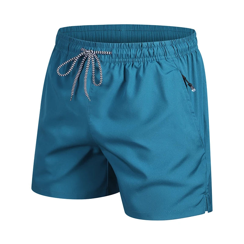 Blue shorts with a drawstring on a white background