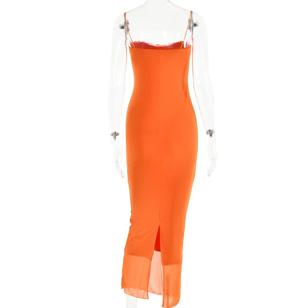 Orange dress with thin straps on a white background