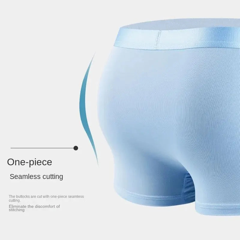 Light blue men's underwear with one-piece seamless cutting on a light gray background