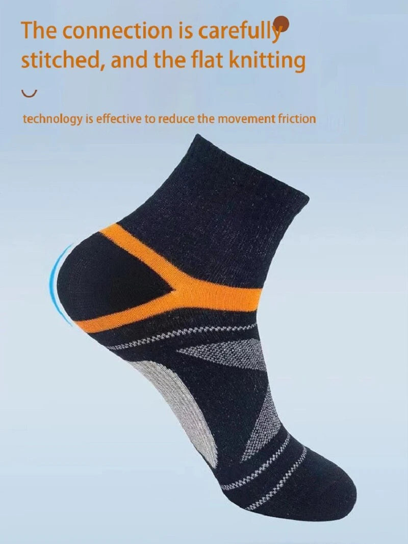 Black sock with orange accent on a light blue background