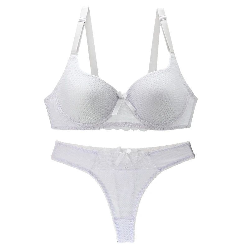 White lace bra and panties set on a white background