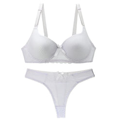 White lace bra and panties set on a white background