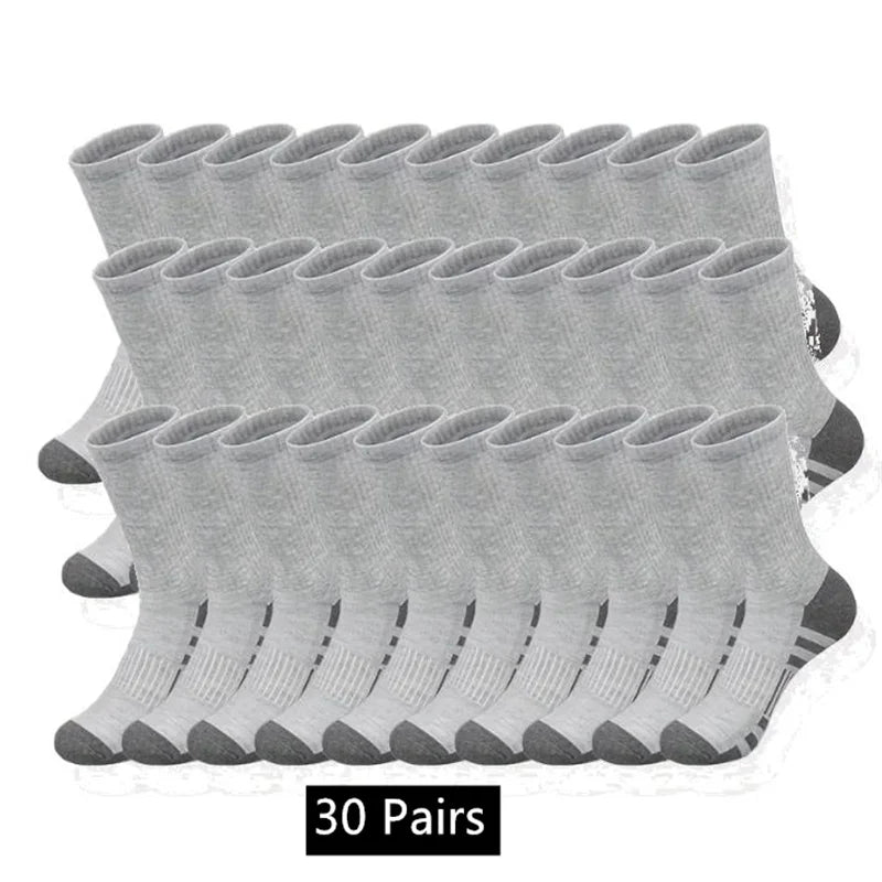 Gray sock with brown accents on a white surface.