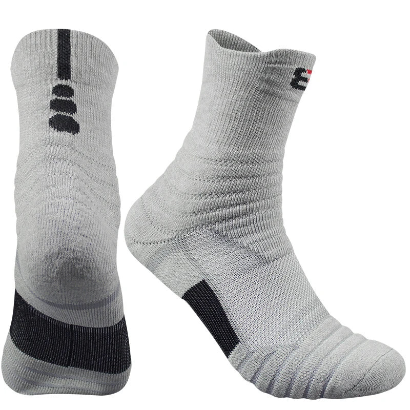 Gray socks with black accents on a white background