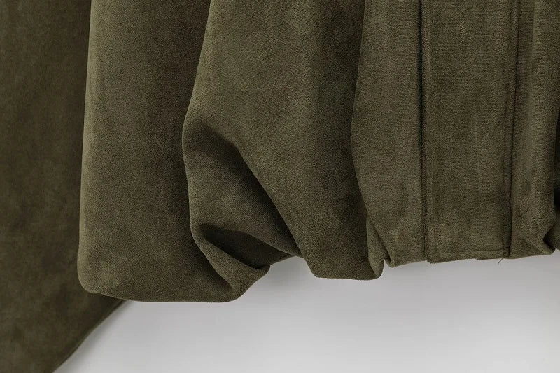 Close-up of brown fabric on a white surface