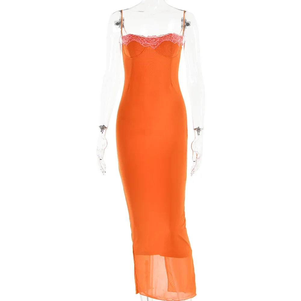Orange slip dress with lace details on a white background