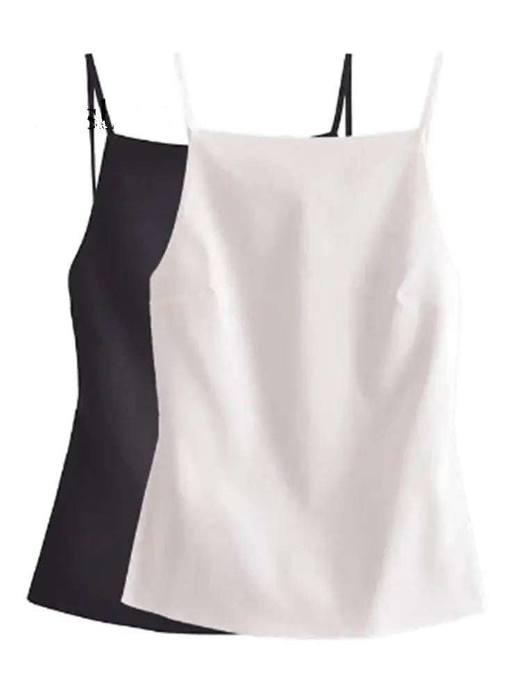 A white and a black backless camisole top with thin straps and a square collar, both are displayed against a plain background.