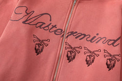 Pink hoodie with 'Mastermind' branding and logo on a plain background
