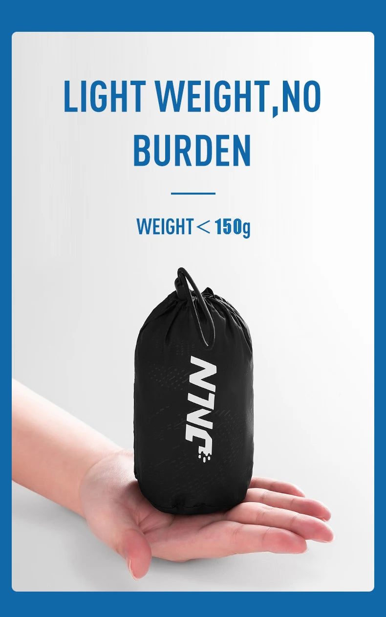 Black drawstring bag held in a hand with 'NYC' branding, on a light gray background.