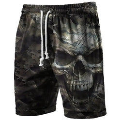Camouflage shorts with a skull design on a white background