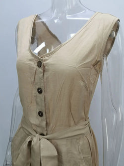Beige sleeveless dress on a mannequin with a plain background