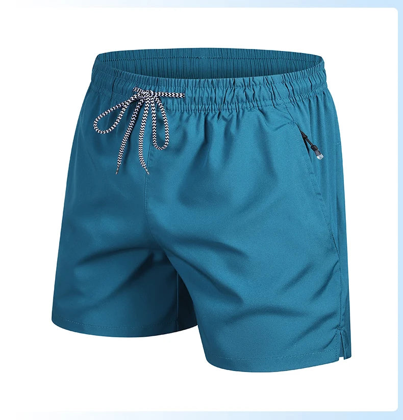 Blue shorts with drawstring on a light blue background