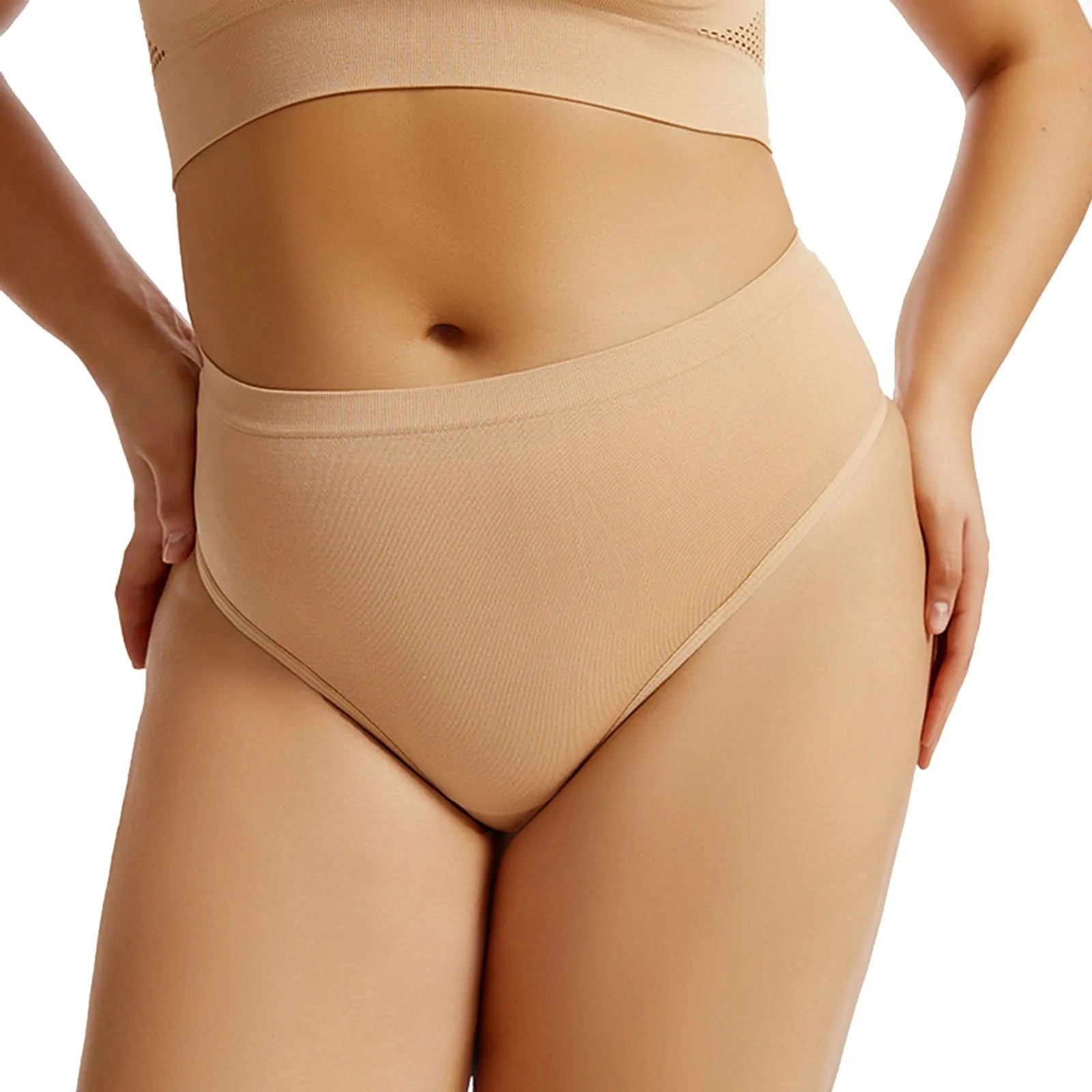 Beige shapewear being worn on a white background
