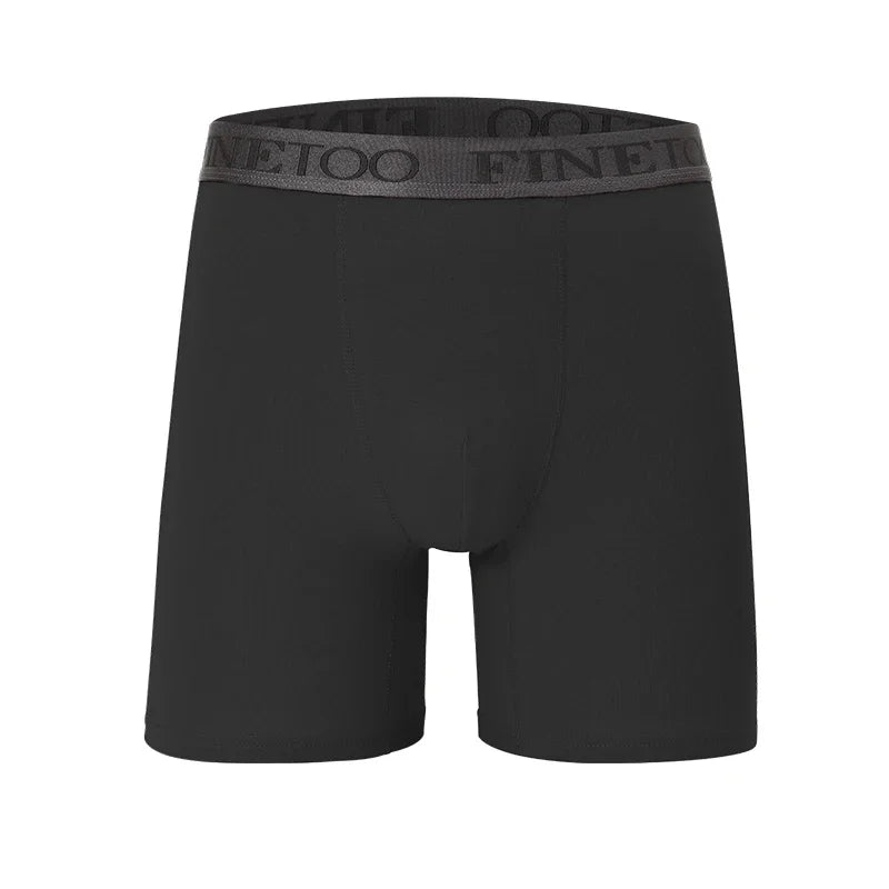 Black boxer briefs with a brand logo on the waistband against a white background
