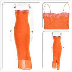Orange dress with lace detailing on a white background