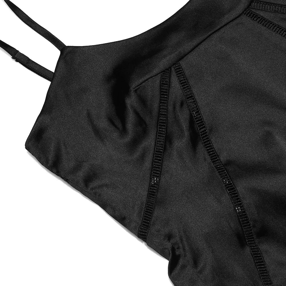 Close-up of a black swimsuit with thin straps on a white background