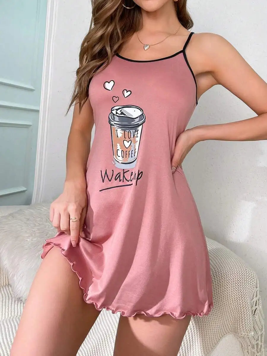Pink nightgown with coffee cup design and 'Wake Up' text on a neutral background