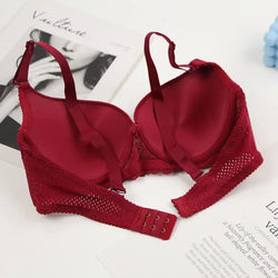 Red bra with lace details on a magazine page