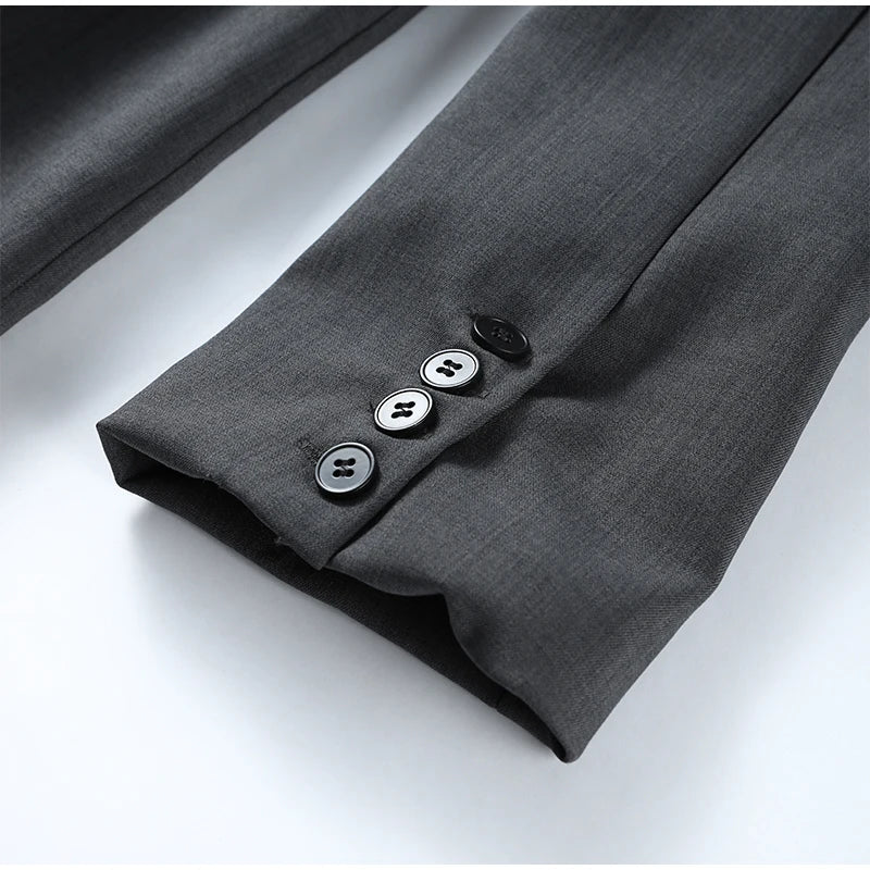 Gray fabric with buttons on a white background