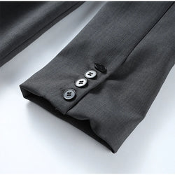 Gray fabric with buttons on a white background
