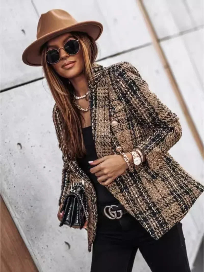 Woman wearing a plaid double-breasted blazer with pockets, styled with a brown hat and sunglasses – autumn and winter fashion jacket