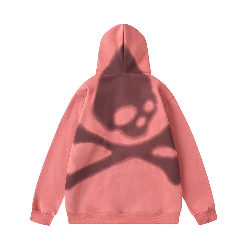 Pink zip hoodie with large skull and crossbones print on the back, on a white background.