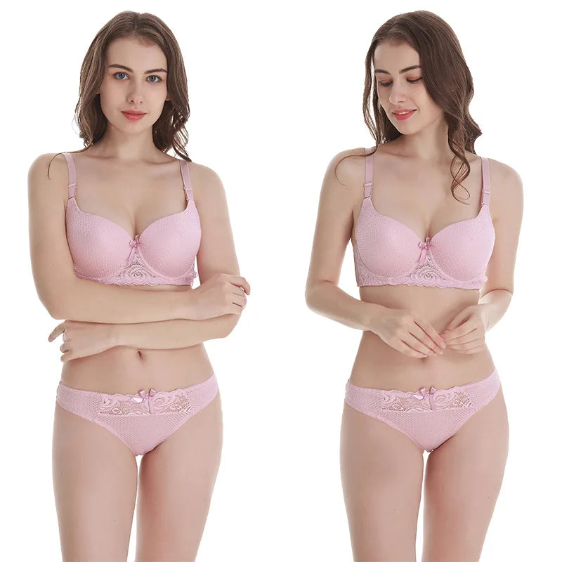 Two models wearing pink lingerie set on a white background