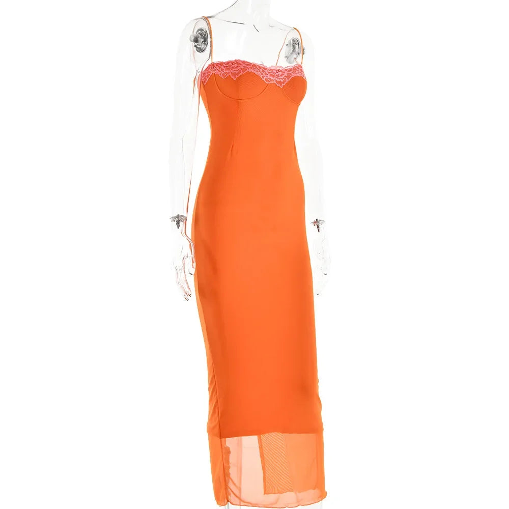 Orange evening gown with lace detailing on a white background